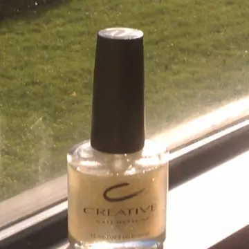 Top coat pailleté., Créative Nail Design.
