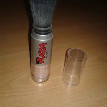 Poudre avec son pinceau, Pucca