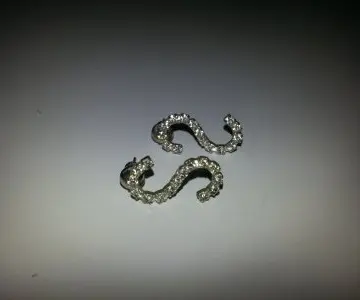 Boucles d'oreilles, Inconnue