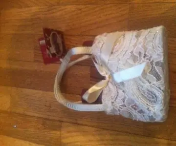 Petit sac produits corps, Tentation