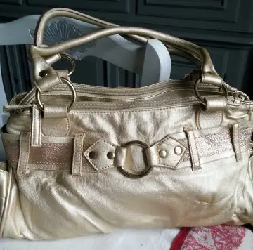 sac a main or, Inconnue