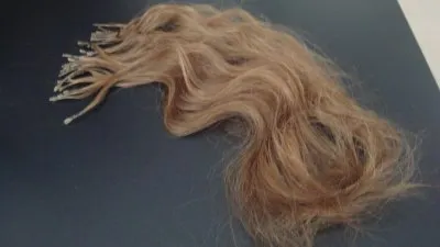 Extension cheveux, Inconnue