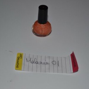 Vernis orange avec paliette