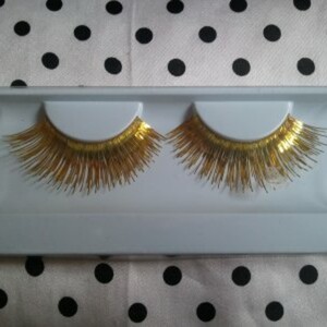 Faux cils or