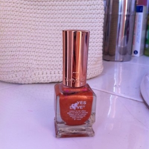 Vernis orange pailleté