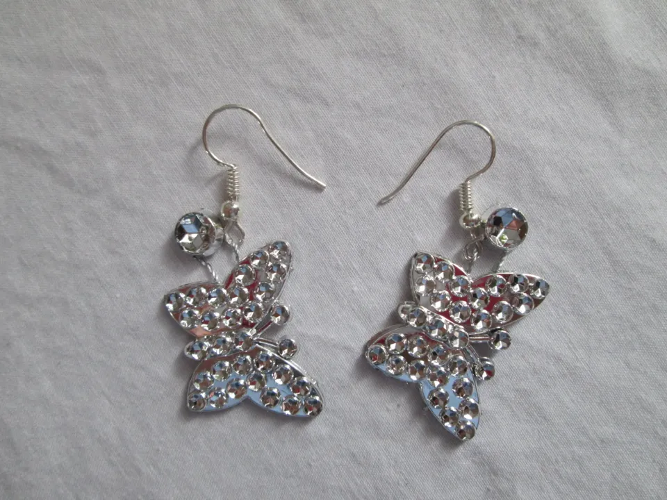 B.O. papillons argentés., Styles & Bijoux