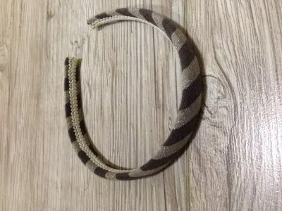 Serre tête gris, Inconnue