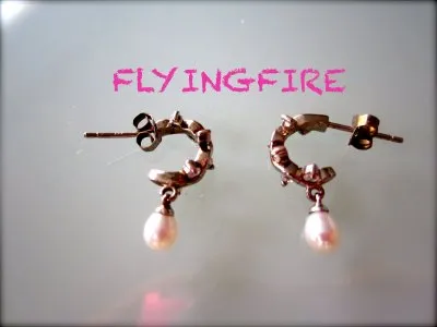 Boucles d'oreilles 6 pierres / 1 perles, Inconnue