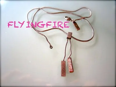 Collier 2 pendentifs, Inconnue