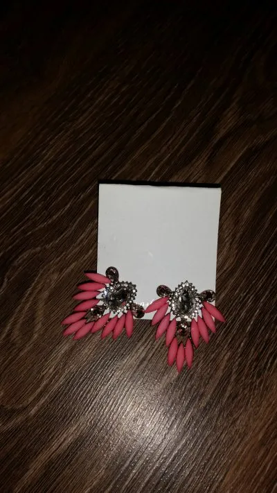Boucles oreilles, Inconnue