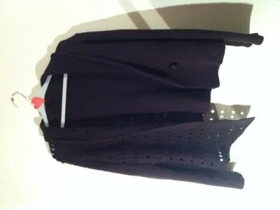 Veste en maille violet., Inconnue